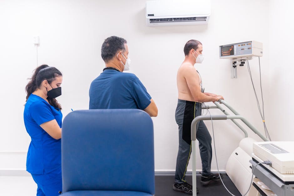 An elderly patient having cardiac monitoring at a hospital in Kochi