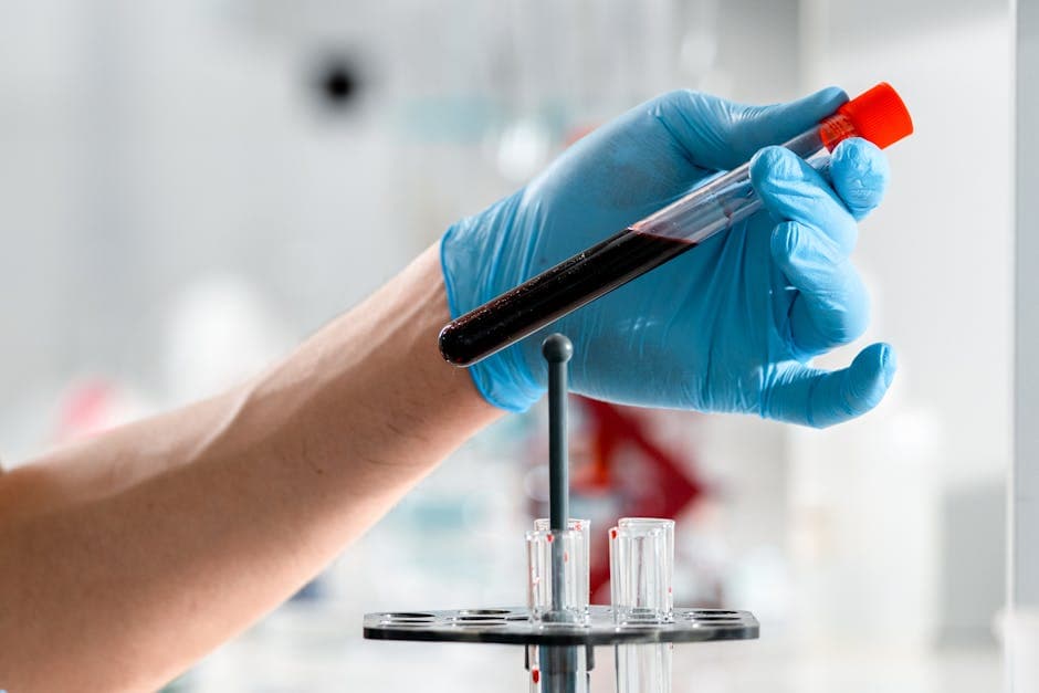 A doctor reviewing blood test lab report results with a patient's family