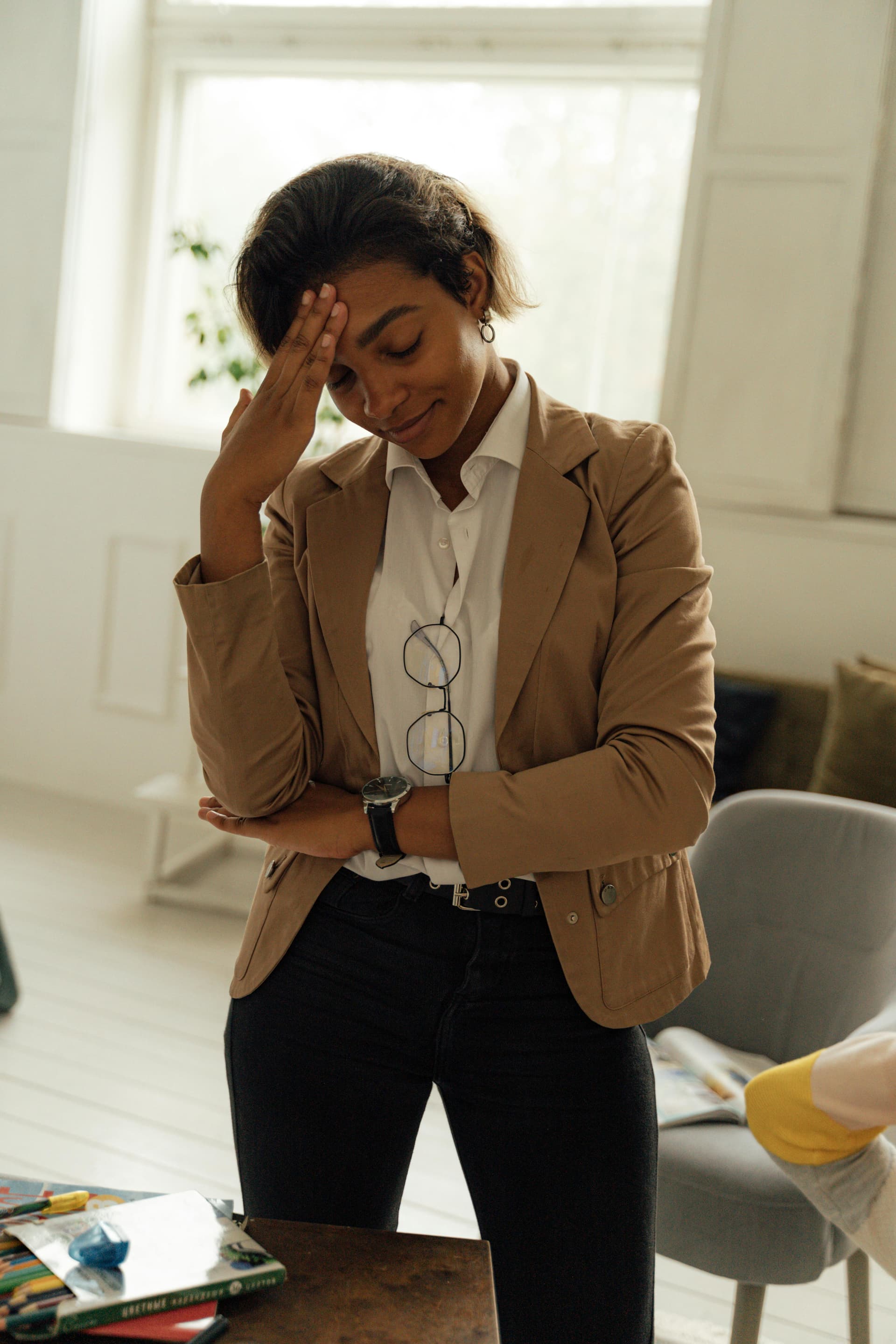 Adult child managing multiple responsibilities and emotions while caring for aging parent