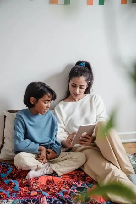 Indian mother and son together at home
