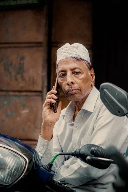 Elderly man on a phone call attending to personal errands