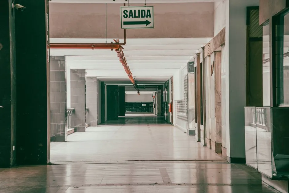 Bright modern hospital corridor with signage