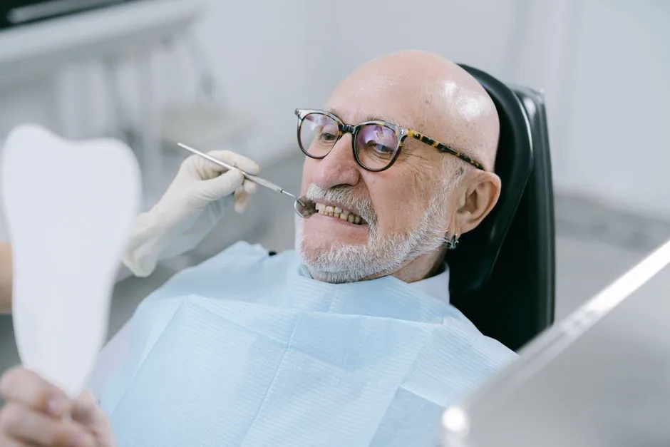 Senior patient at a dental checkup with a dentist