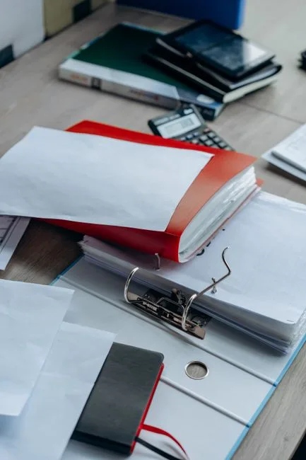 Medical records and documents organized on a desk