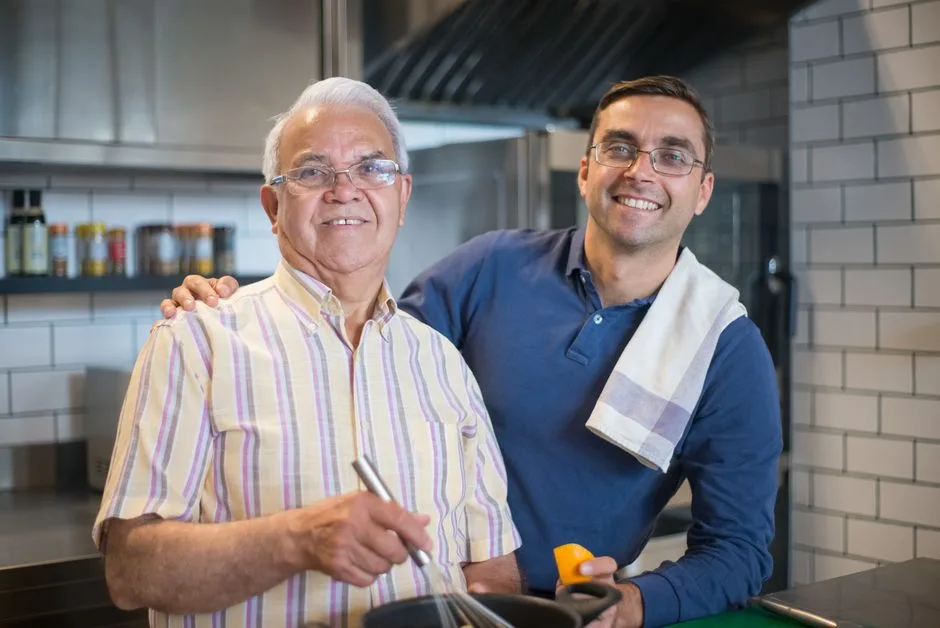 Father and adult son sharing a warm moment together